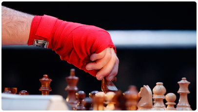 Гибридный вид спорта, объединяющий в себе шахматы и бокс